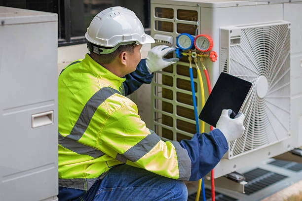 Professional Air Conditioning Repair technician working in Fall River, WI